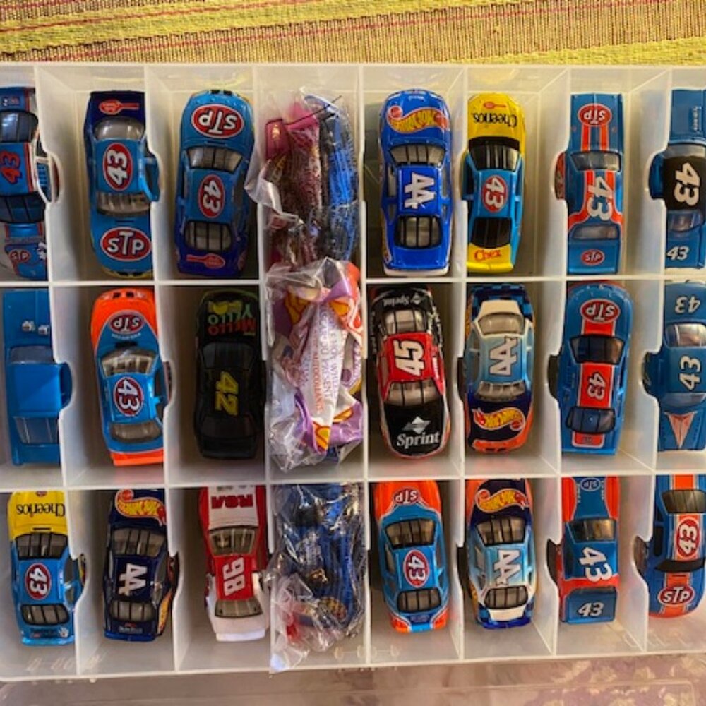47 Matchbox cars in case with wrapped mcdonalds 44 ones